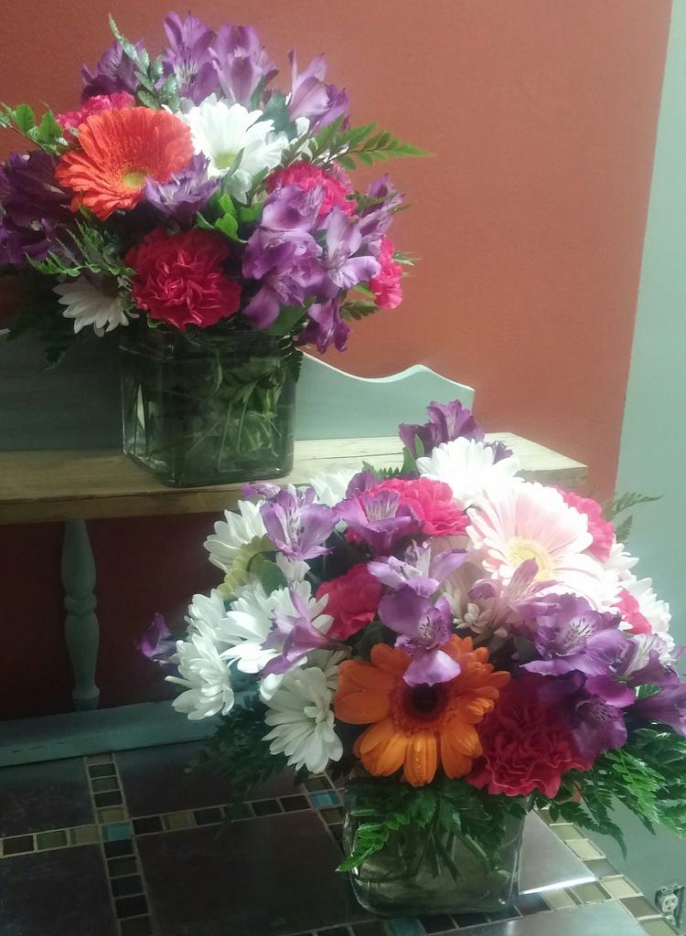 Bright and colorful arrangements going out today...😀😀😀