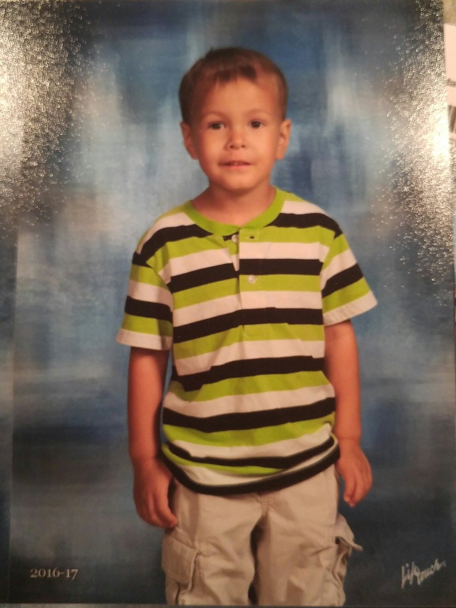 BuzzYourButton's tweet photo. Awe!! My babies 1st ever school picture. 

Somebody please caption his facial expression! Lol https://t.co/w6S7peajKi