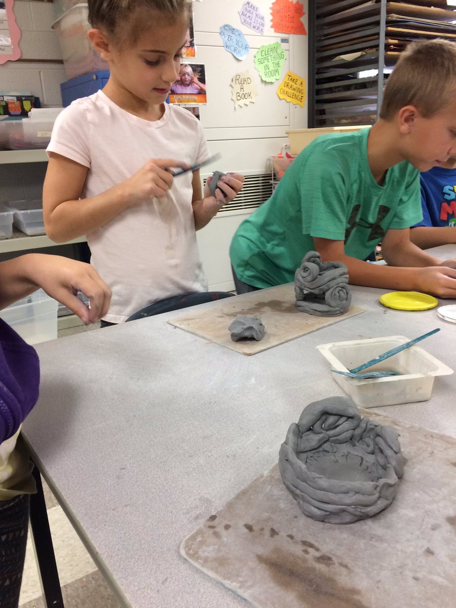 carlson_brandy's tweet photo. 3rd gr. Ss learn how to build coils to create pots! These kids really shot for the moon with this lesson...look how awesome! #wleced https://t.co/HQsO4s63dJ