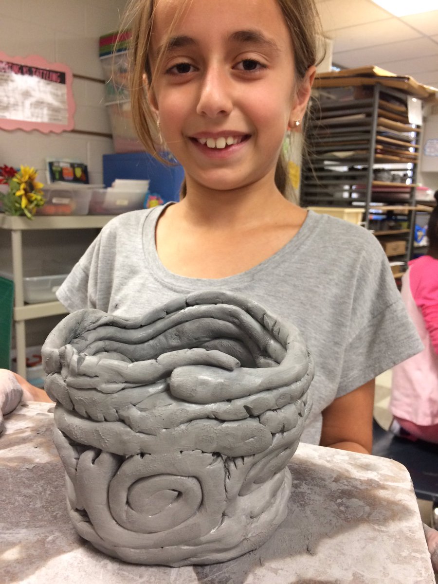carlson_brandy's tweet photo. 3rd gr. Ss learn how to build coils to create pots! These kids really shot for the moon with this lesson...look how awesome! #wleced https://t.co/HQsO4s63dJ