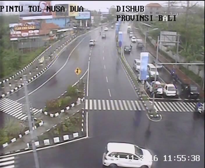 JUMAT, 11-11-2016, ( 12:00 ) Kondisi lalin simpang PINTU TOL NUSA DUA terpantau RAMAI LANCAR dari arah TAMAN GRIYA.