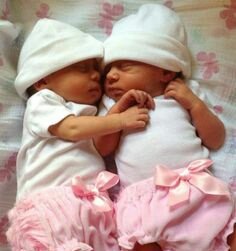 "My wife and I are so happy to finally welcome Rebekah Lauren and Everette Sophia to our family. Our other girls will love them to bits." ❤