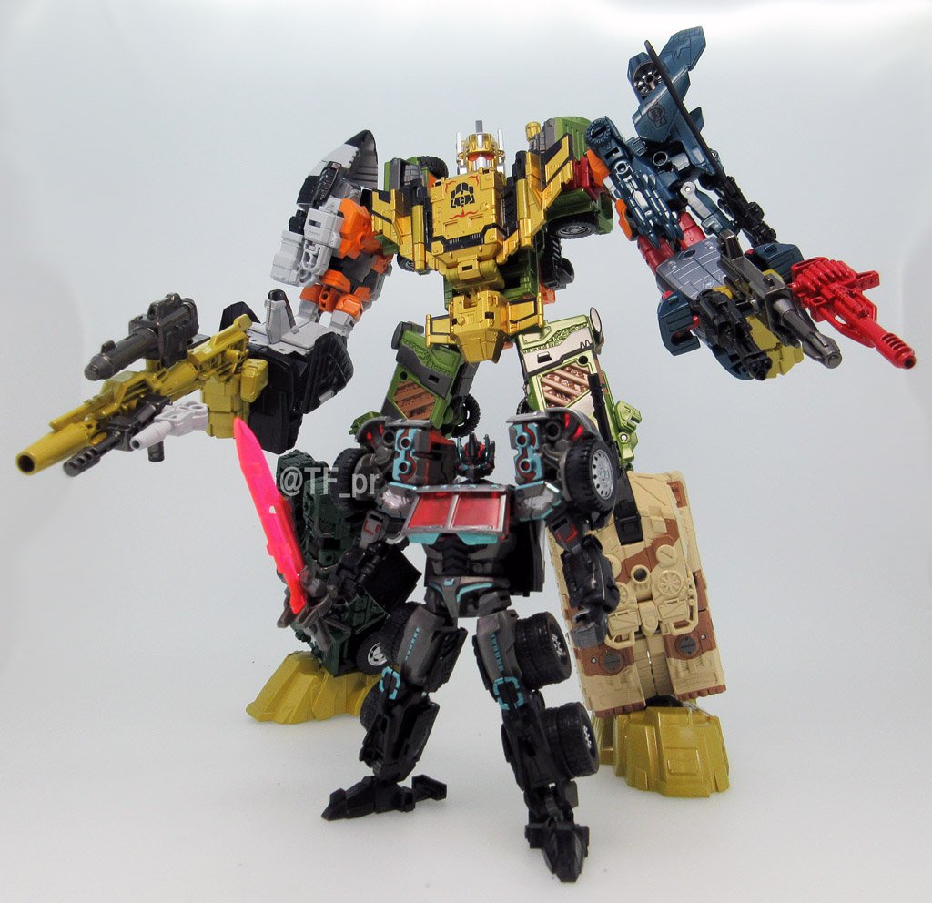 Transformers News: UW-EX Baldigus image posed with LG-EX Black Convoy