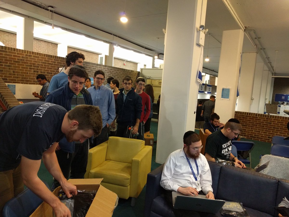 MLHacks's tweet image. There's a @CapitalOne T-shirt frenzy at #inventyu right now!