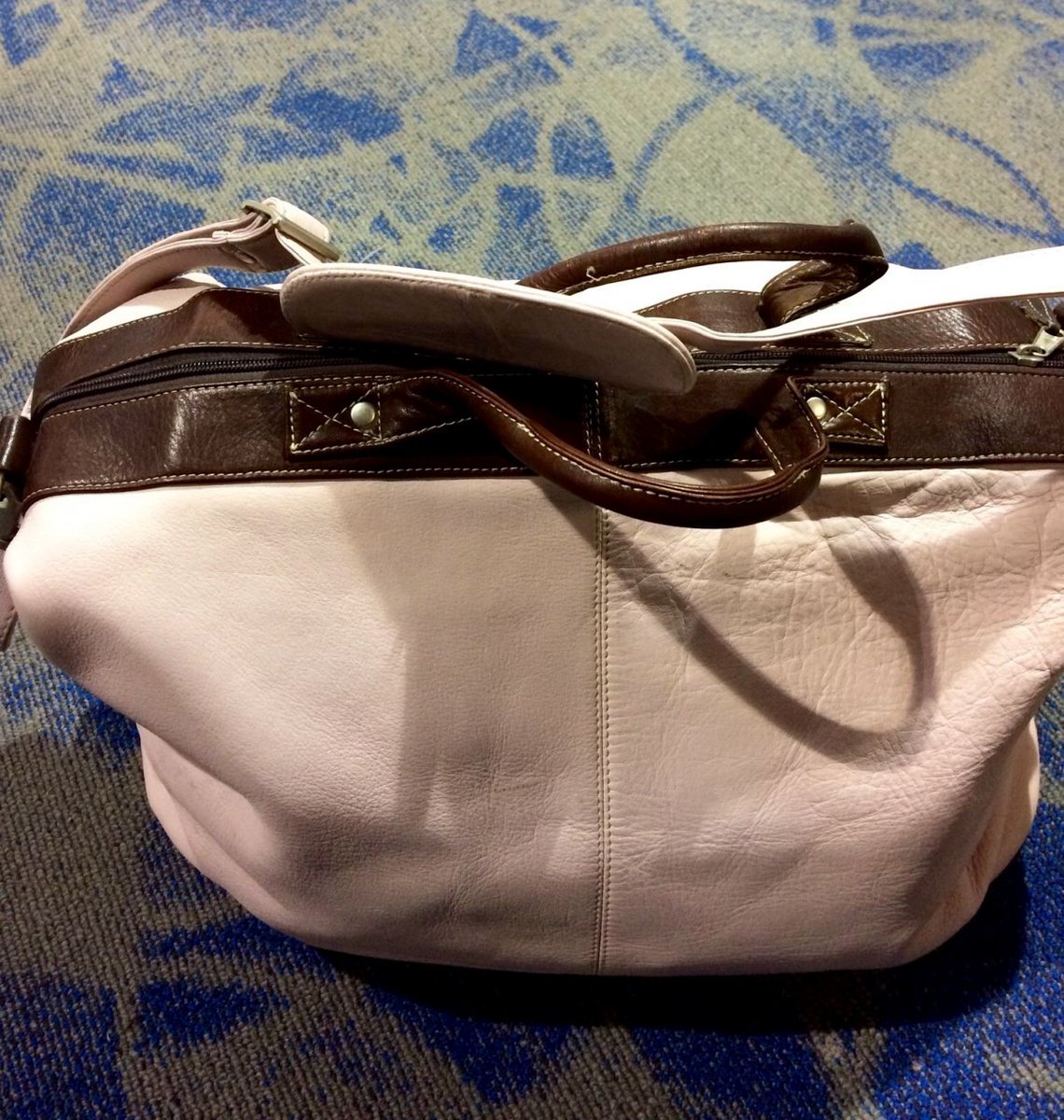 kevinmd's tweet photo. The pink bag that symbolizes how far this physician has come ... https://t.co/DVFlwDjBT4 via @kevinmd https://t.co/fK552lIgo9