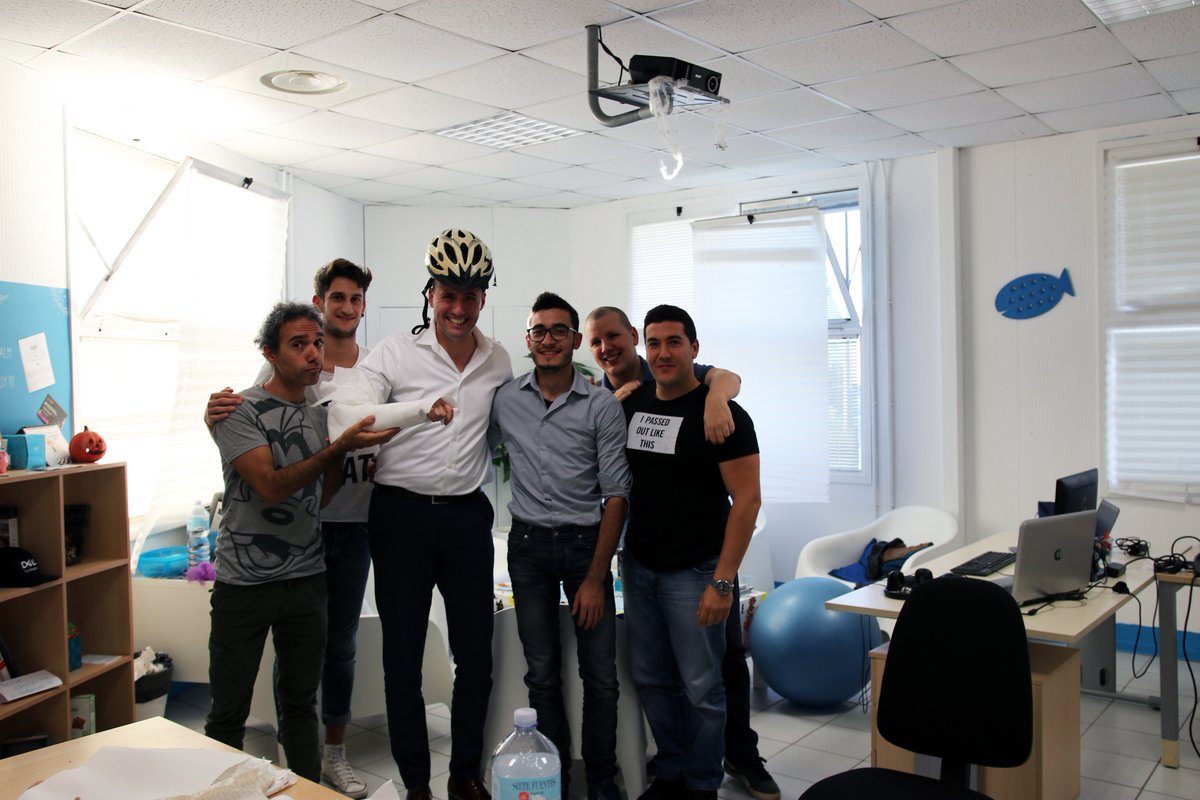 harvey_robb's tweet photo. My first Halloween @entando. I dressed up as our lead developer (and avid-cyclist), Eugenio @eugeniosant. #DontBikeAndCode #notjustajob https://t.co/feK52oDTT7