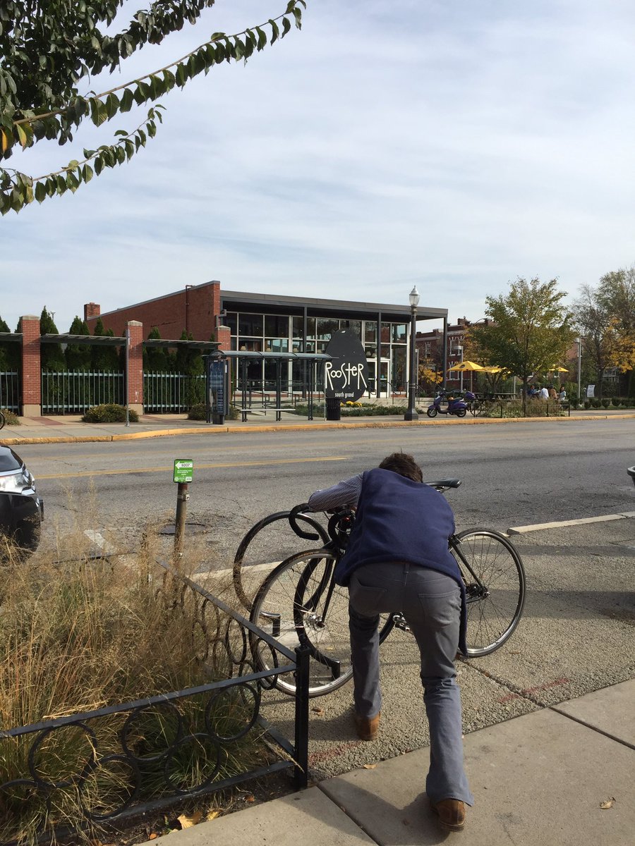 cariandanthony's tweet photo. @greenbilliken This is the only picture we took- Anthony locking up his bike outside of Rooster! https://t.co/GiN7oUBKwF