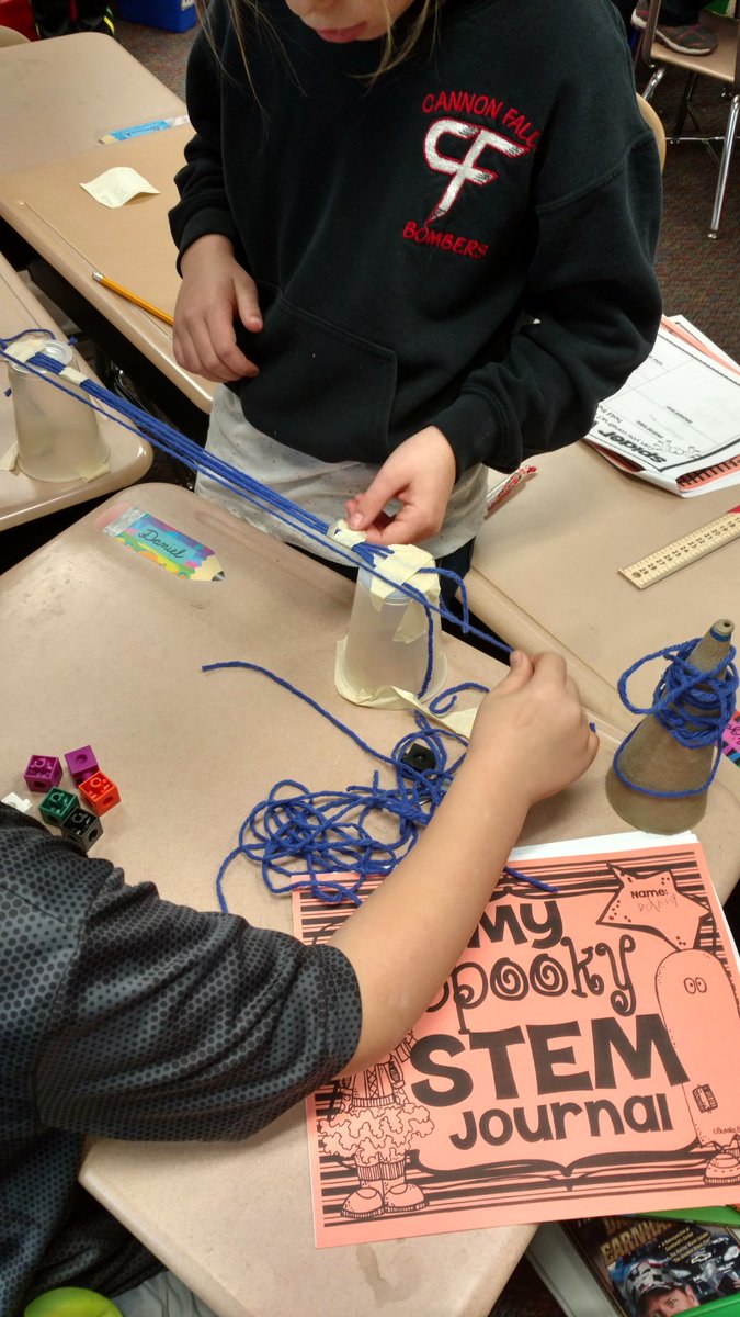 MrsKadrlik's tweet image. Who&apos;s bridge will hold the most blocks using yarn, tape, and cups? 
#cfelem #spiderwebbridge #spookystem