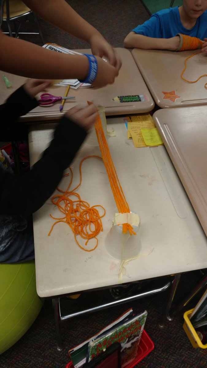 MrsKadrlik's tweet image. Who&apos;s bridge will hold the most blocks using yarn, tape, and cups? 
#cfelem #spiderwebbridge #spookystem