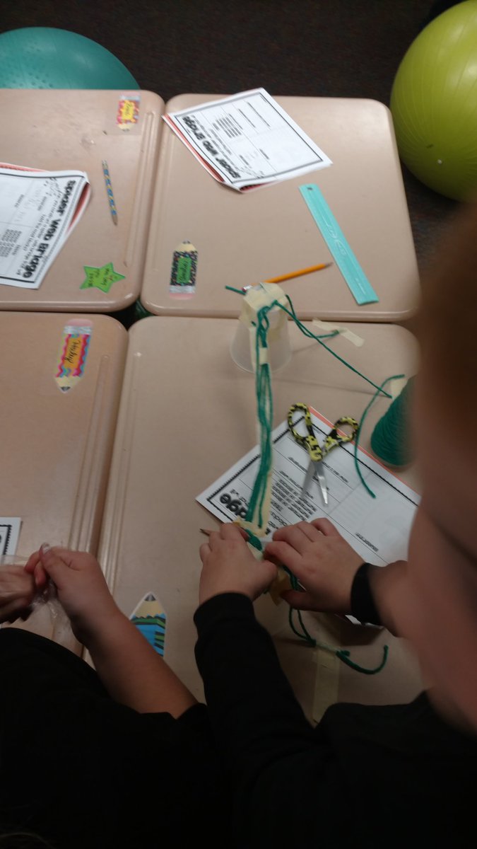 MrsKadrlik's tweet image. Who&apos;s bridge will hold the most blocks using yarn, tape, and cups? 
#cfelem #spiderwebbridge #spookystem