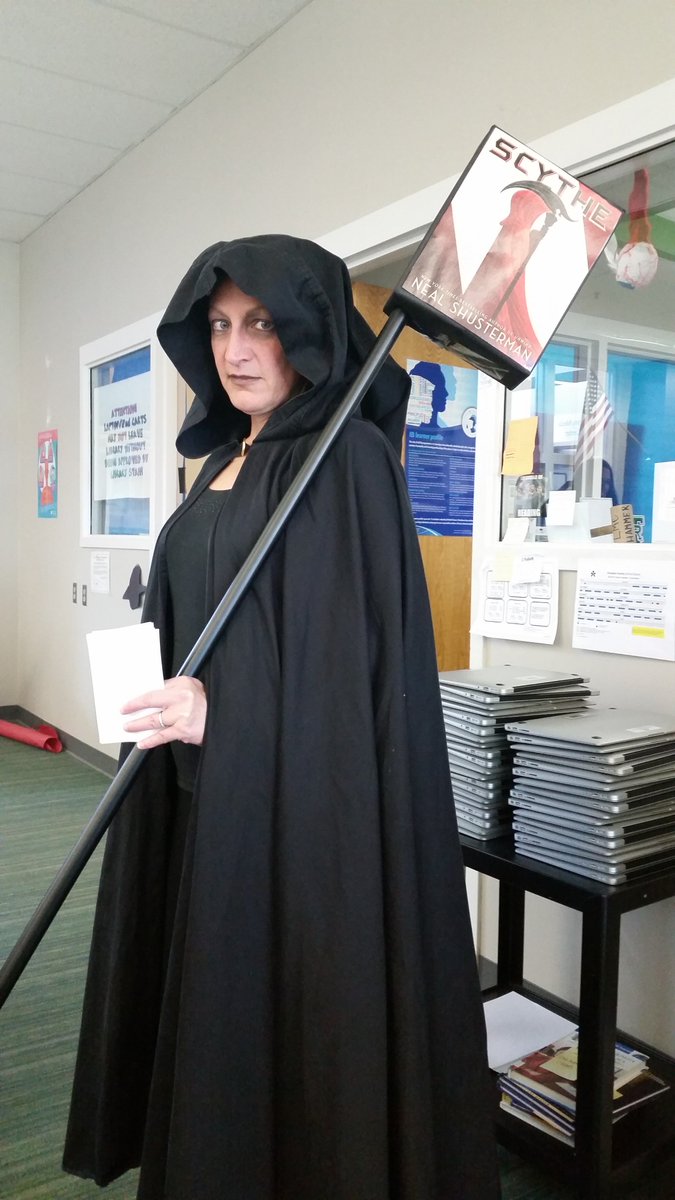 trhslibrary's tweet photo. Ms. Sjoland as the Book Reaper! @trsostrength @NealShusterman #trwhatsyoursos #halloween #reaper #fearthereaper https://t.co/lMcXGbYKKa
