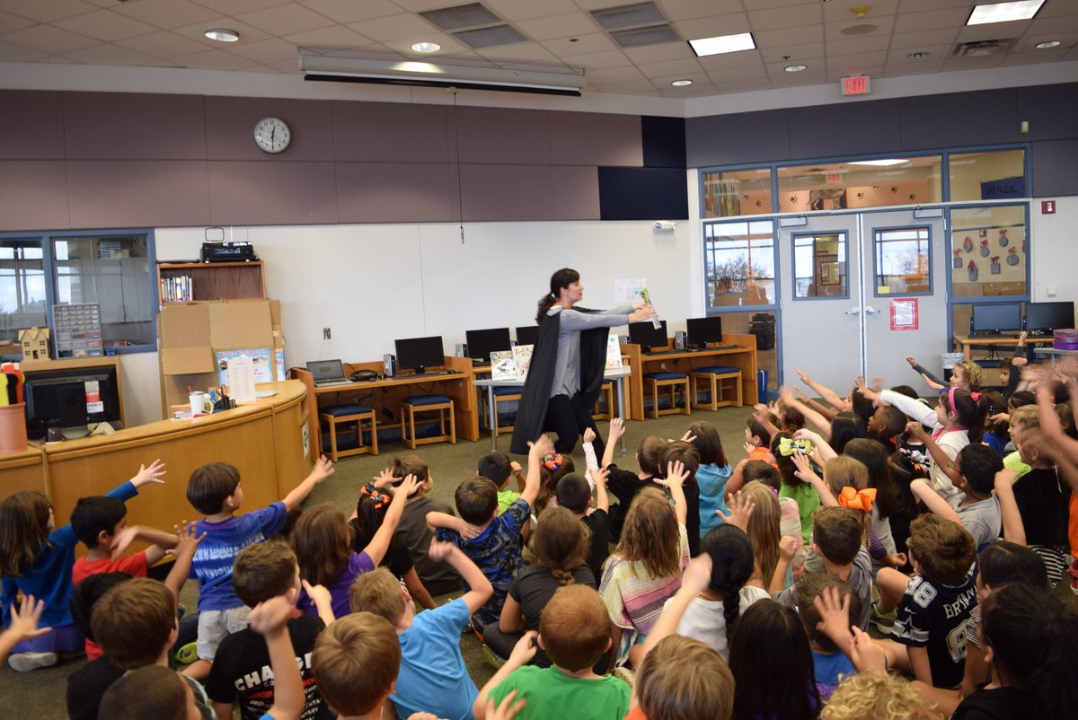 ReadDanceTweet's tweet photo. Magic Storytime in the Library! The Mystical Magical Ms. Watts thrilled 1st grade with tricks and books! #booksaremagical #magicweek https://t.co/p7FmmviPay