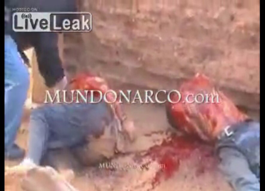 GRAPHIC: Mexican Drug Cartel Beheads Two Captives With Chainsaws..You want ...