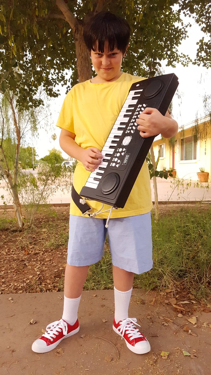 zotsf's tweet photo. My son decided to do Gene from Bob's Burgers this year. https://t.co/f4tbvbVC6o