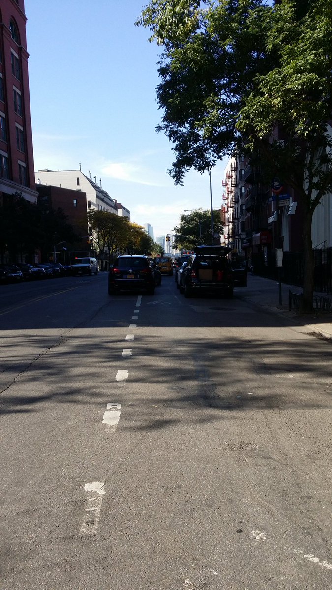 MakeQueensSafer's tweet photo. 3 cars can't decide: block bike lane or road?? Do both. #christopherSt https://t.co/S4ycJVG0kV