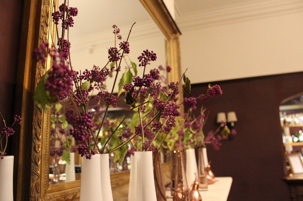 An array of deep plums and copper accents look beautiful on our fireplace this week! <a href="/thewildfoxuk/">The Wild Fox</a>