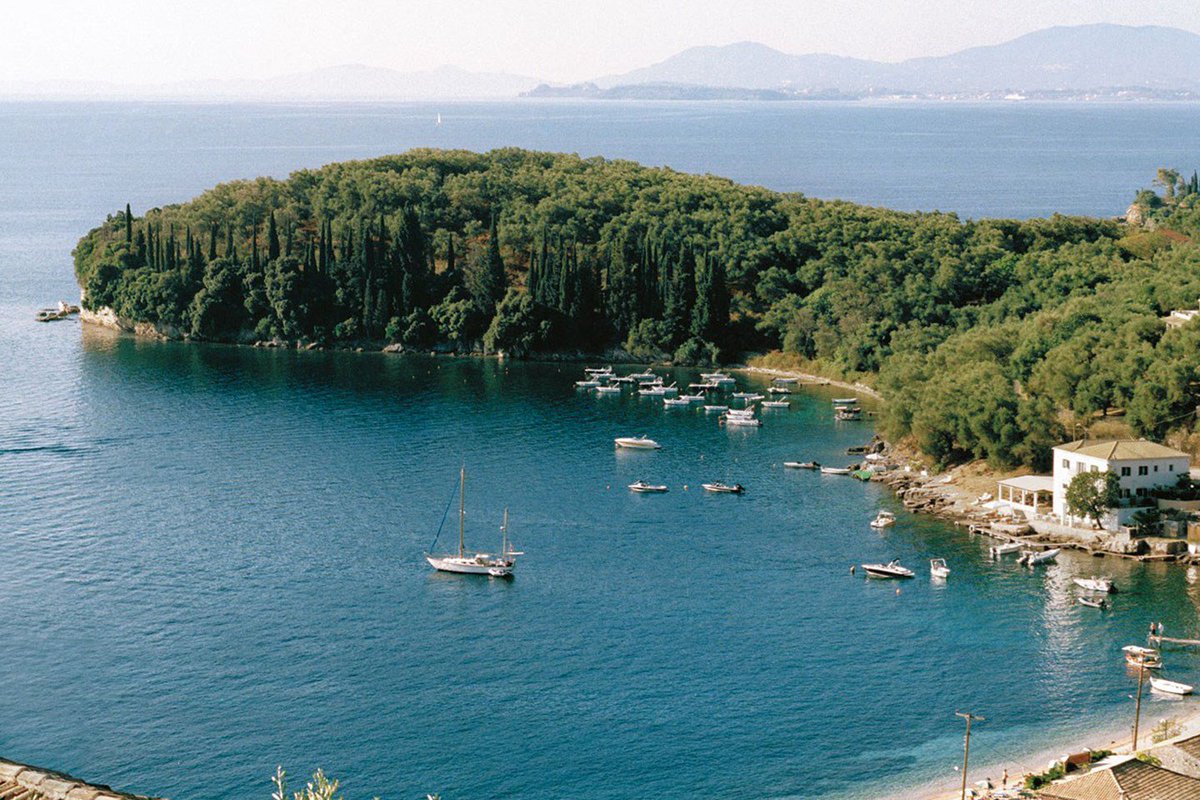 cntraveller's tweet photo. The evergreen Greek island that’s lovely year-round: https://t.co/pjNMgqSrq2 https://t.co/8E708c58Zx