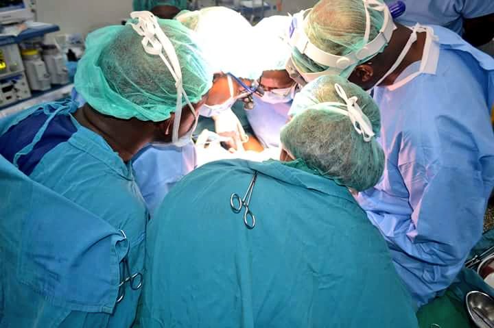OliverMathenge's tweet photo. The Kenyan team that successfully carried out the first ever separation of conjoined twins in Africa. 📷 via Kenyatta National Hospital https://t.co/dR7zapaj2J