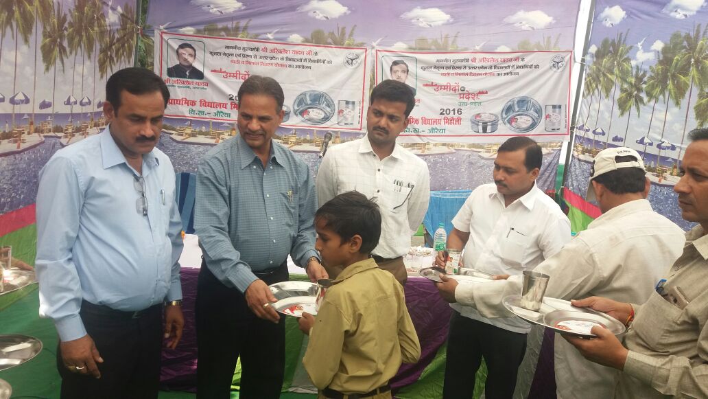 Distribution of utensils for primary and upper primary students.