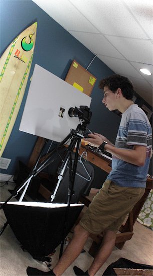 This is our Chief Visual Engineer hard at work digitizing photos for a music video shoot!