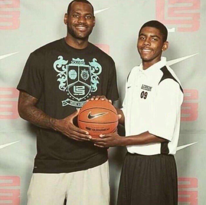 CauseWereGuys's tweet photo. A high school Kyrie Irving with LeBron James back in 2009 at one of LeBron's camps. Who would have thought they would win a ring together. https://t.co/qhce0XaXby