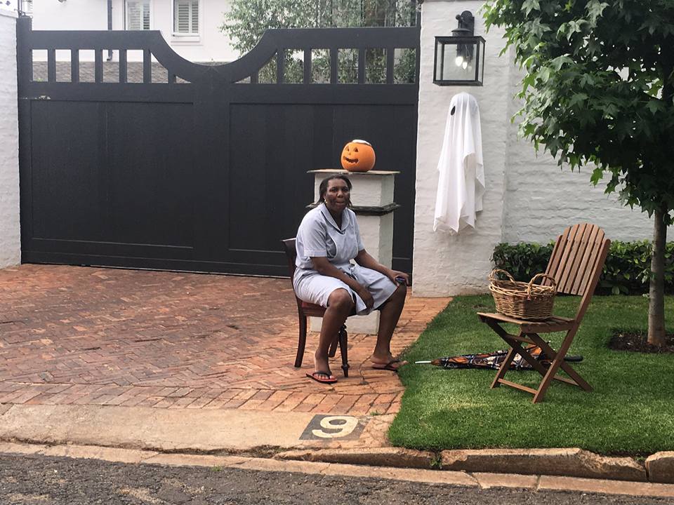 africasacountry's tweet photo. WTF > #Halloween in #SouthAfrica where black domestic workers made to sit outside so owners don't have to answer gate via @justteaplease https://t.co/zDuRtu6V3m