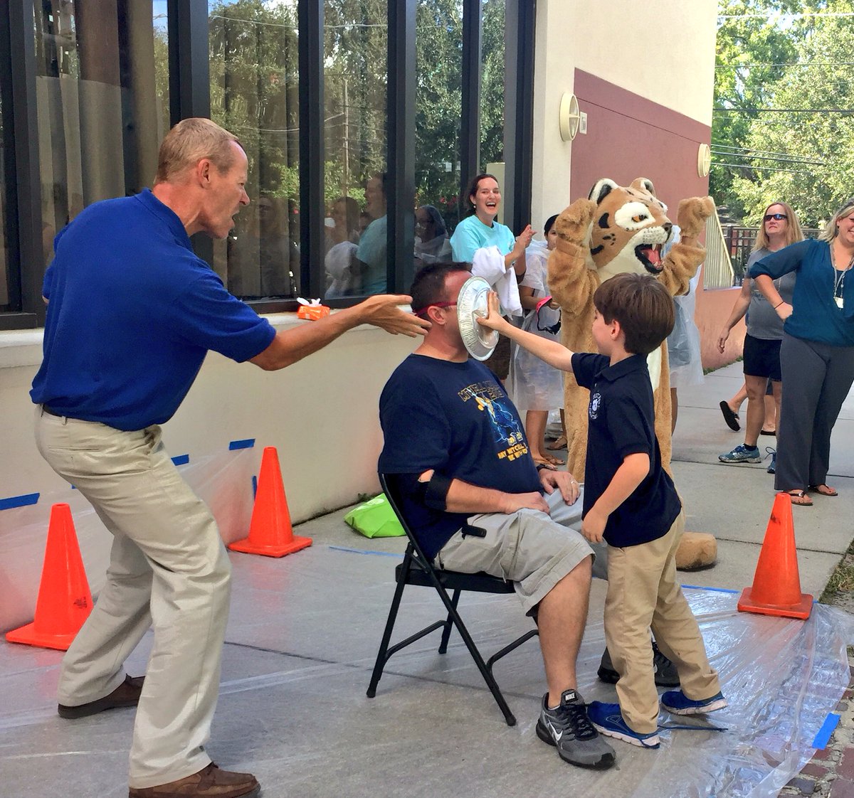 Mitchellhcps's tweet photo. What better way to celebrate raising money for Mitchell than a pie in the face! #funrun2016 #bobcatshavegrit https://t.co/rrXFWMPp7b