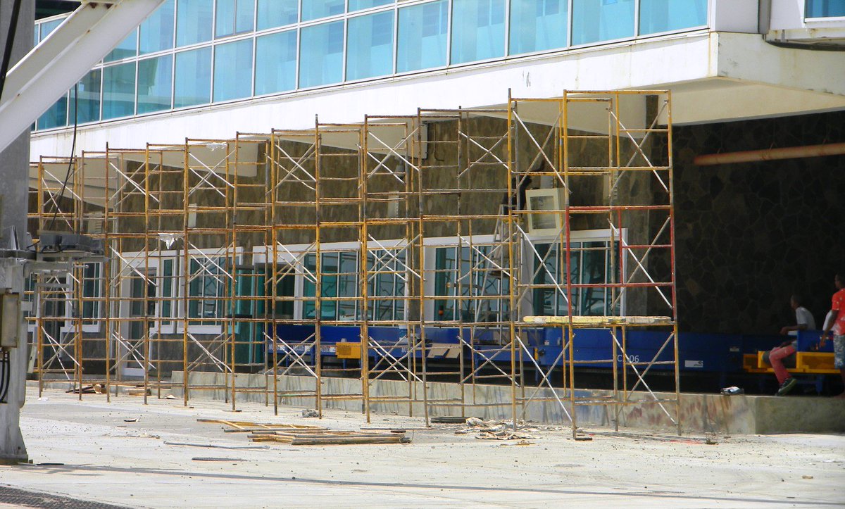 ArgyleIntl's tweet photo. Scaffolding being erected to commence painting on the Terminal Building. https://t.co/aiw7PSibU4