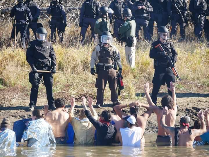 zhaabowekwe's tweet image. Cleveland @Indians: on every TV station. Police brutality against actual Indians at Standing Rock: crickets. #AmericanNarrative #NoDAPL