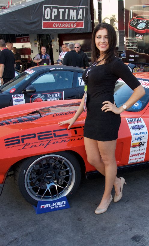 DODTechNAmerica's tweet photo. Our host @DemiChalkias taking a break to pose with some of the other beauties here at #sema2016 #dodtech #dashcamera #SEMAShow #SEMA #babe https://t.co/e3v0AjVQRU