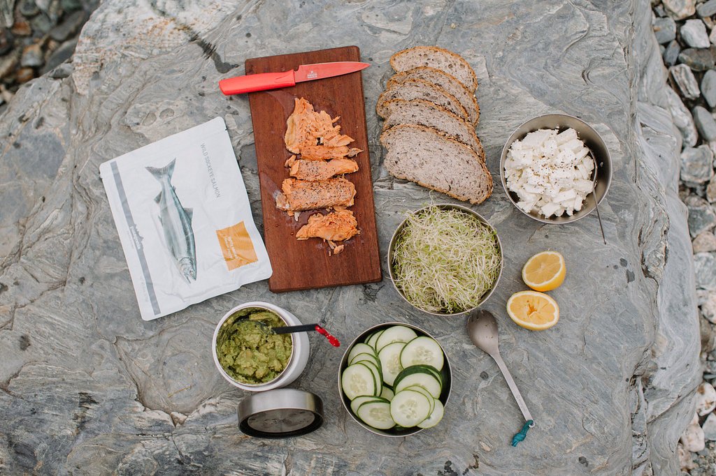 PatagoniaProv's tweet photo. Wild salmon, hearty bread, and a few fresh toppings. #Lunch on the go. #lunchwithaview Photo: @gregbalkin #salmon #wildsalmon #sustainable https://t.co/mp5HUjeTPm