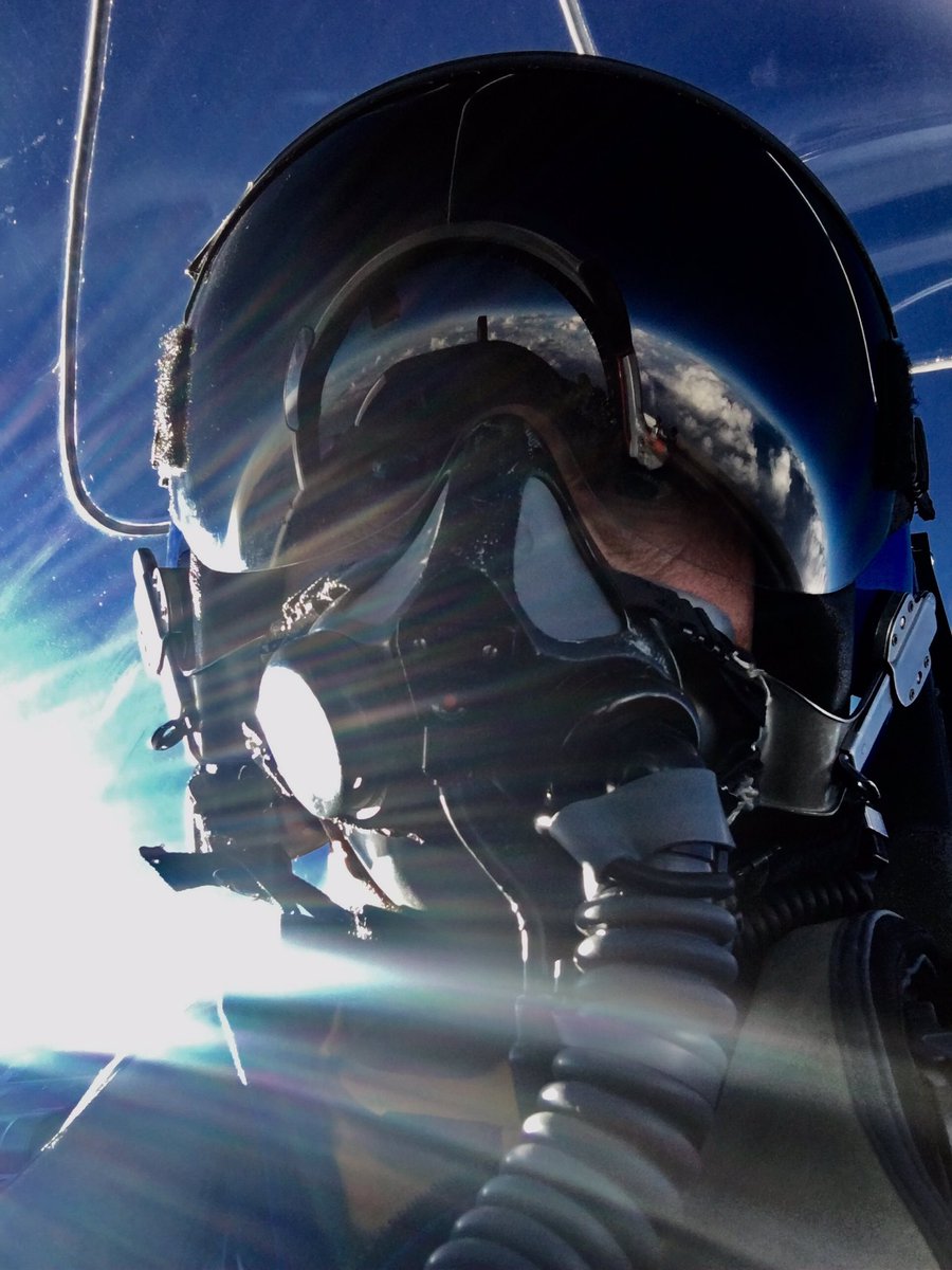 astro_reid's tweet photo. Visor reflection looked good at 41,000 feet today. That's 1.3 million feet lower than @Space_Station altitude but still... https://t.co/lrIdy5MDHq