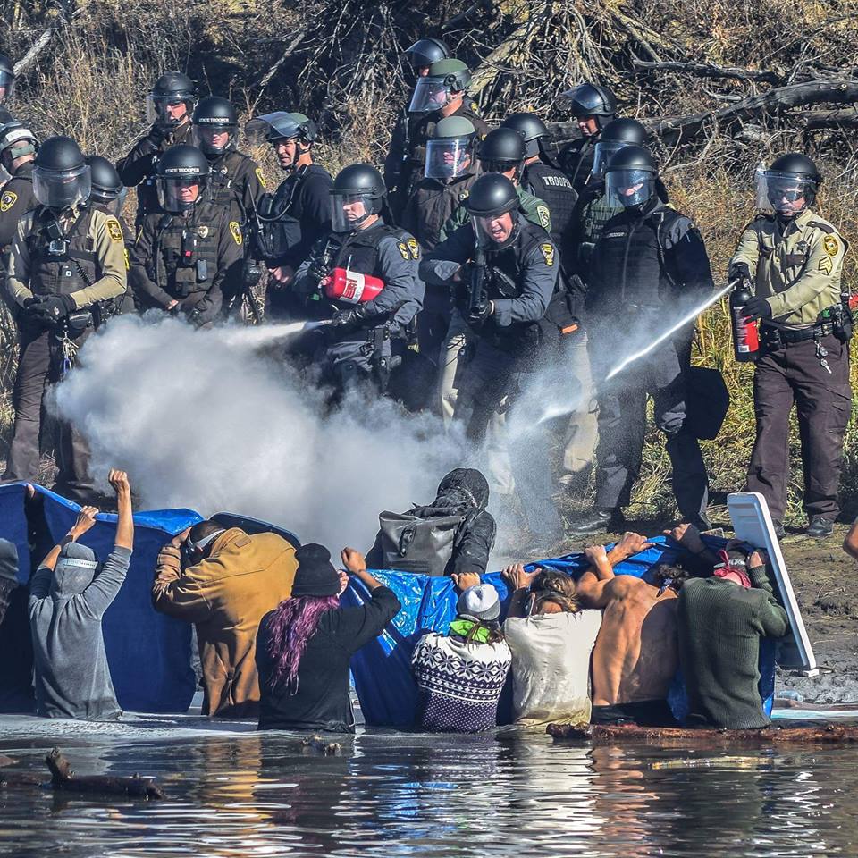 MikeHudema's tweet image. Standing Rock Water Protectors met with pepper spray and rubber bullets: bit.ly/2fz02jy #ActOnClimate #NoDAPL #WaterIsLife