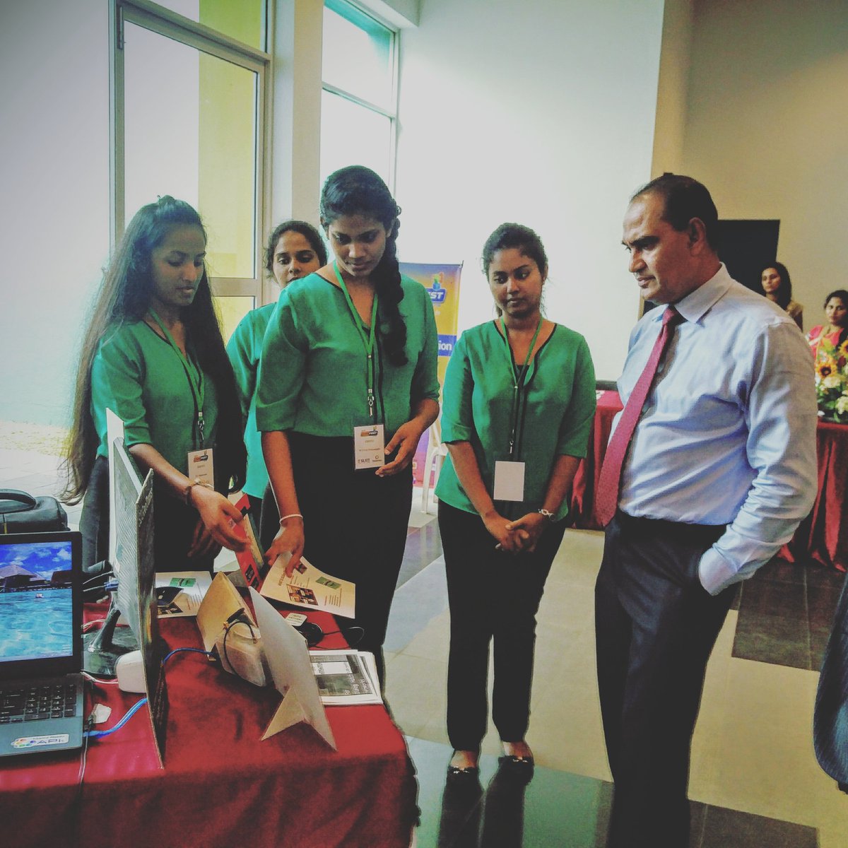 SLIITinfo's tweet image. Pr. Lalith Gamage checking out some of the products showcased at #Codefest2016