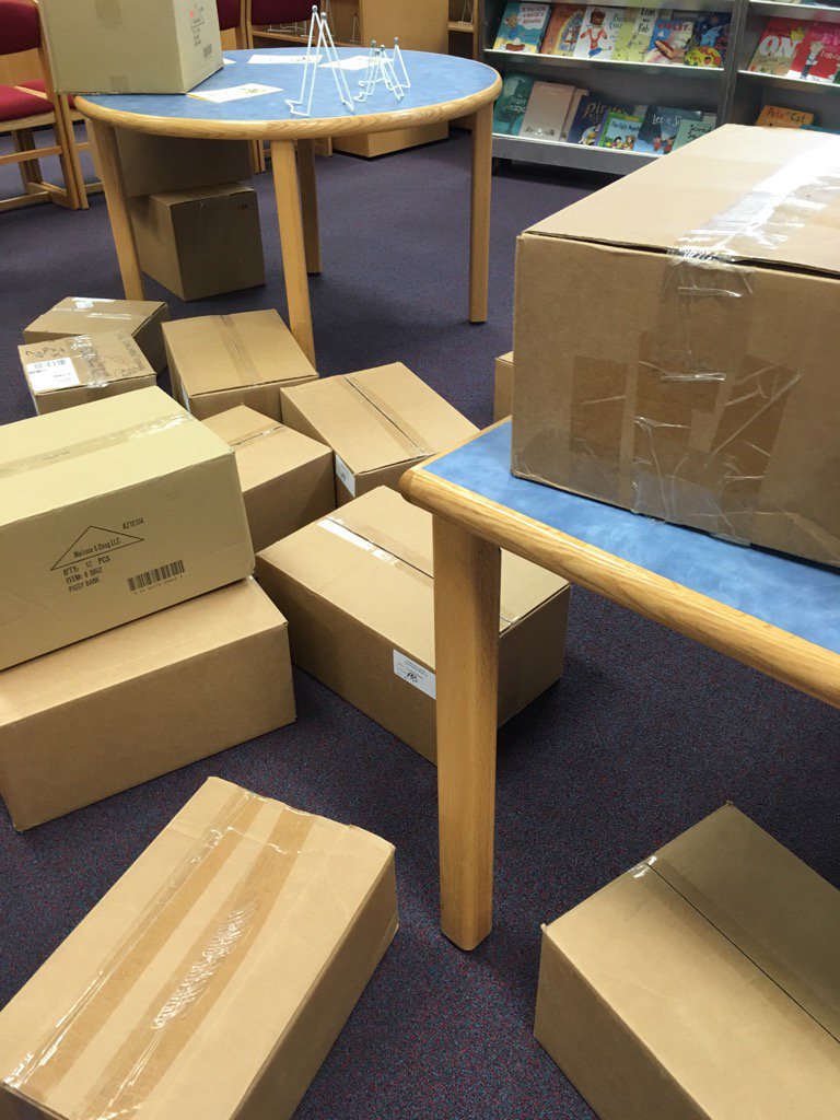 Book fair set-up! Come to the library this morning to help unpack a box or two 😀#FHHighlights