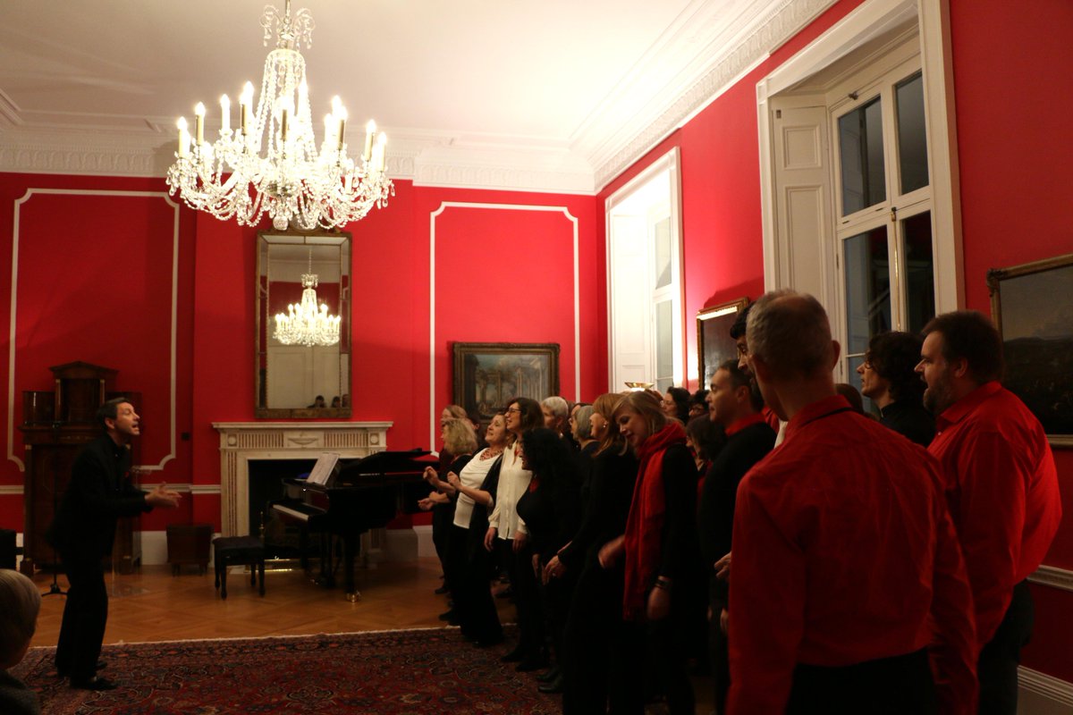 GermanAmbUK's tweet photo. Wonderful performance by interfaith Mixed Up Chorus against the backdrop of Frances Aviva Blane &amp; Darin Ahmad's art at my residence y'day. https://t.co/I5bEbdhiF7