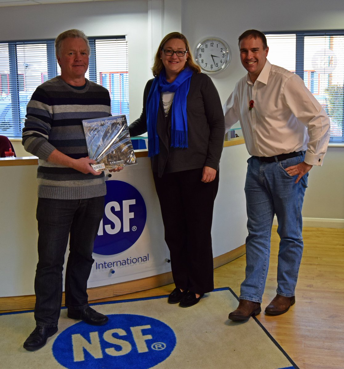 NSF_Agriculture's tweet photo. And the winner of the calendar prize draw is....Peter Lay. Pictured with Suzi from @RABIcharity and the new UK MD Rob Chester #wellyweek2016 https://t.co/4Dlp1fFPT6