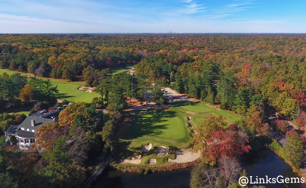 The famous 18th at Pine Valley in full fall splendor, with the Philadelphia skyline peeking over the trees directly behind. Amazing sight.