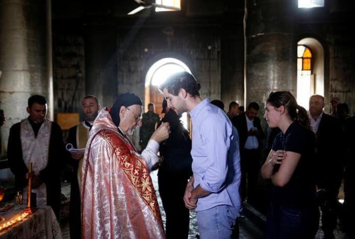 _ThePRC's tweet image. #Iraq: Christians Worship Amid Charred Church Ruins for First Time Since Liberation ow.ly/UJ1c305T0is #IDOP
