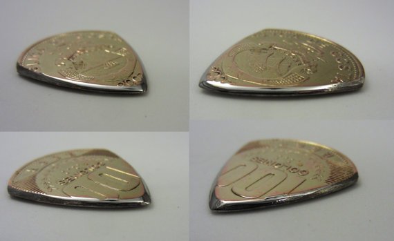 worldcoinpicks's tweet photo. Costa Rican 20 Colones. That's a fancy emblem, but shined up really well. #etsy #worldcoinpicks #guitarpicks #guitar https://t.co/pgXeLbrIj4