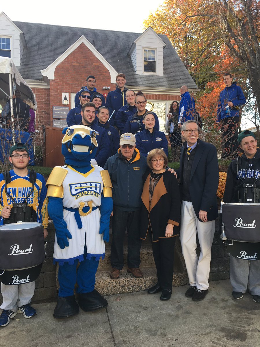 Sam and Lois Bergami with the <a href="/unhmb/">UNH Marching Band</a>