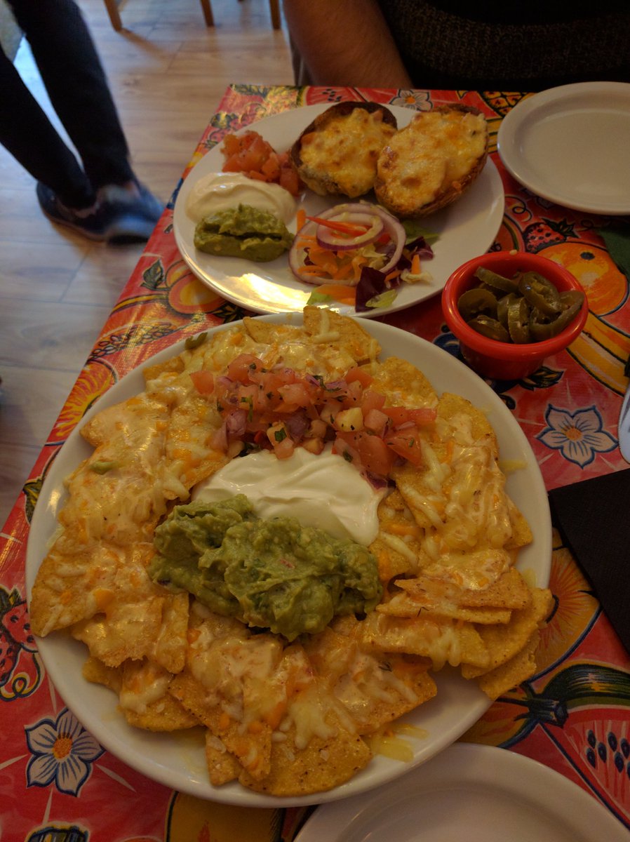 Superb nachos at <a href="/DosSombreros/">Dos Sombreros</a>. Give the mango smoothie a go next time you're in #Brighton.