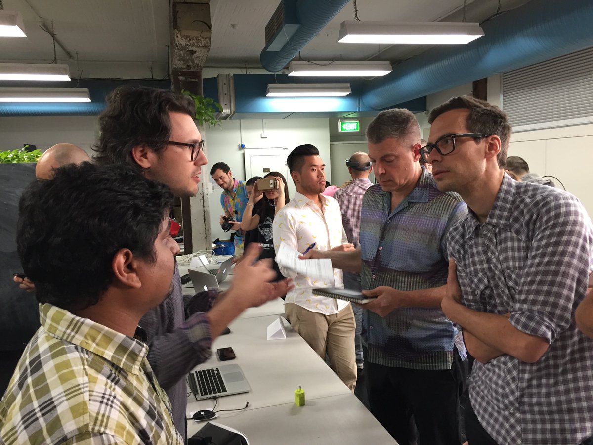 immersivehack's tweet photo. Judges goes around the #VR fair booth at #ImmersiveHack #hackathon https://t.co/3FM0oAuDjJ