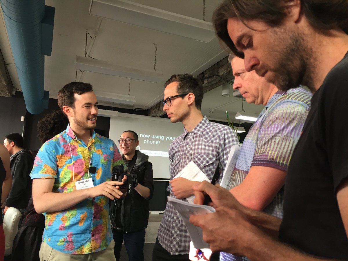 immersivehack's tweet photo. Judges goes around the #VR fair booth at #ImmersiveHack #hackathon https://t.co/3FM0oAuDjJ