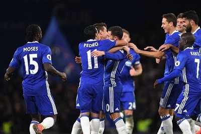 Chelsea caught fire on Bonfire Night as they dragged Everton through the mud 5-0 to move to top of the Premier League table. Victor Moses was on target