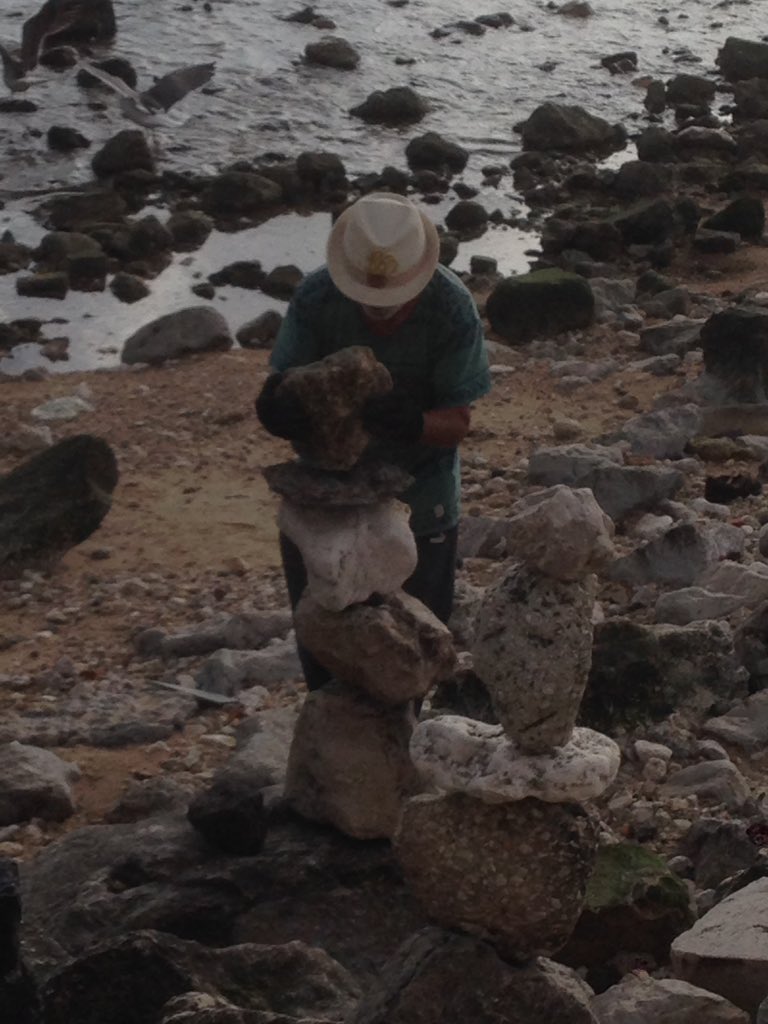 parlamind's tweet photo. True #entrepreneur:stacks rocks at #Lisbon shore to make sculptures. They fall. He shrugs. Tries again. #WebSummit https://t.co/khTHGgCRSo