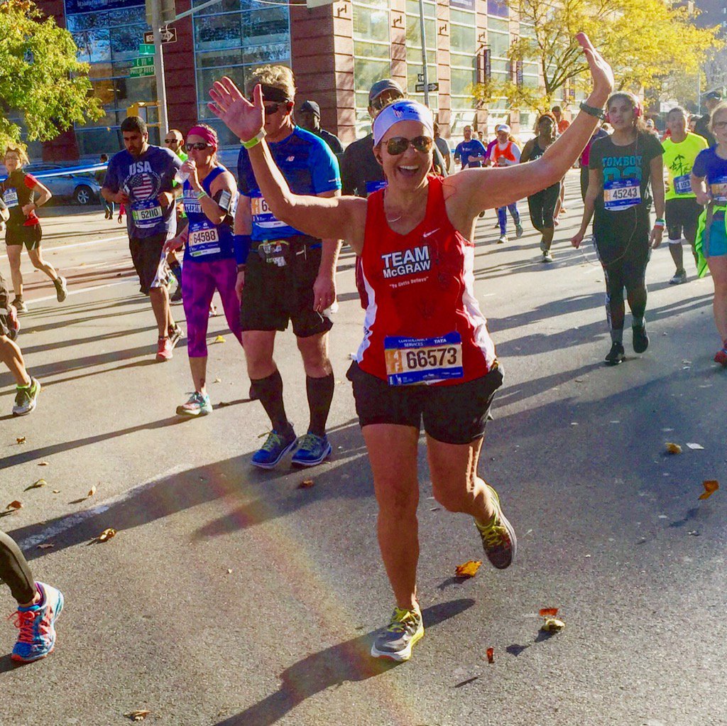 TeamMcGraw's tweet photo. Still enjoying the day, @LizWeed21 is beaming at Mile 18! #run #nycmarathon #runners https://t.co/UX57RG86Io