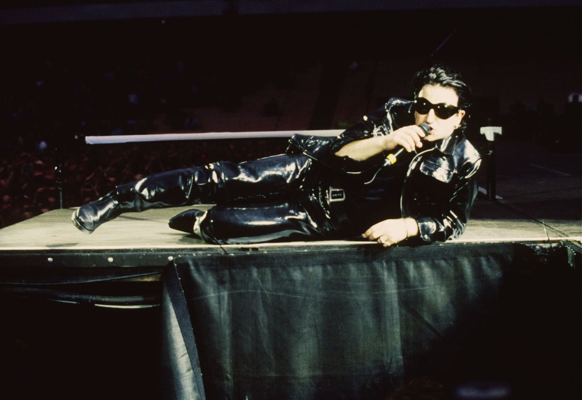 U2's Bono, back in 1993 during the ZOOROPA Tour, wearing our fly sunglasses #zootv #u2 #thefly #theflyshades #rock #achtungbaby