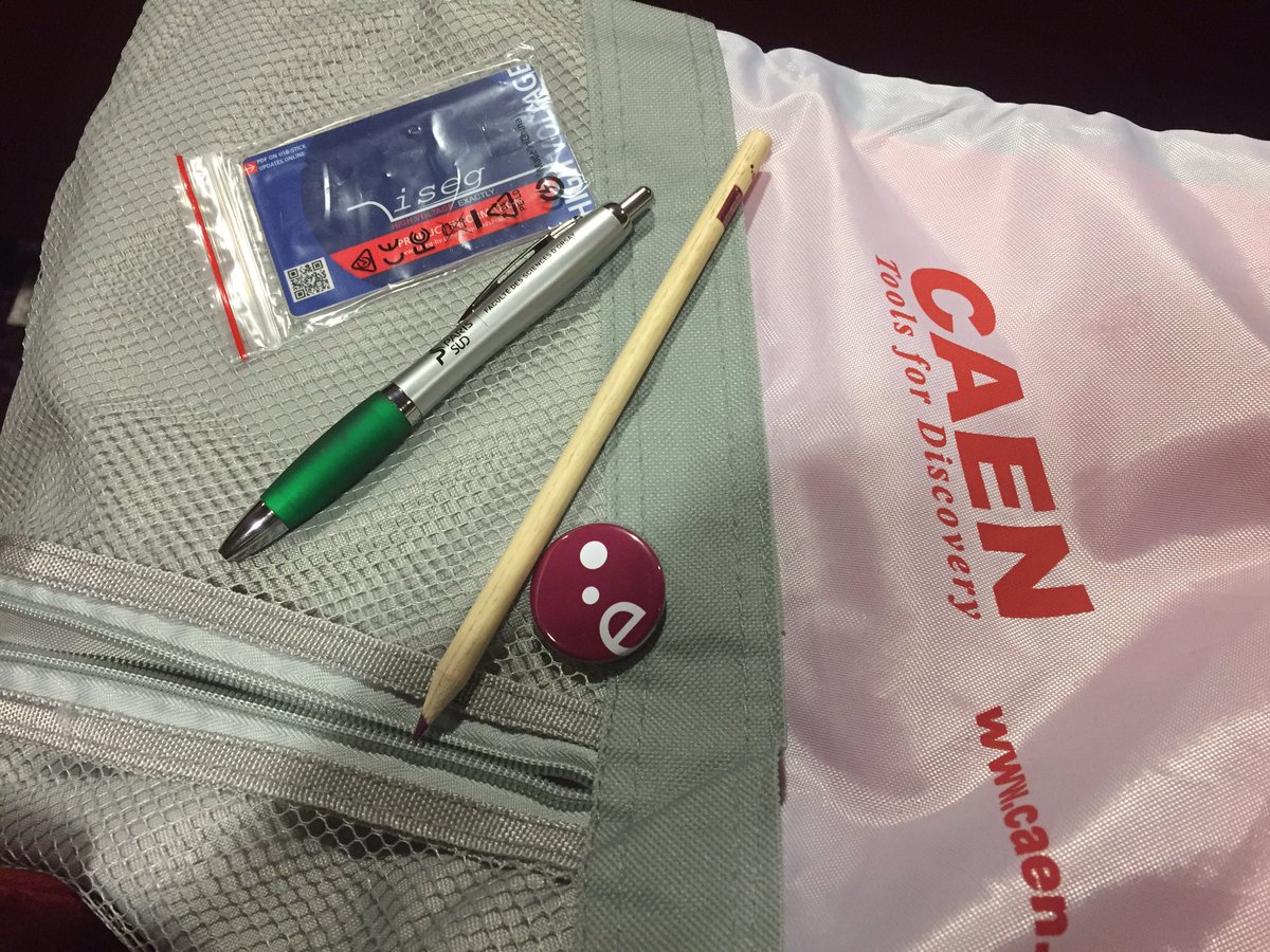 nuclearaj's tweet image. #ssnet conference goodie bag highlights - purple pencil and matching badge.