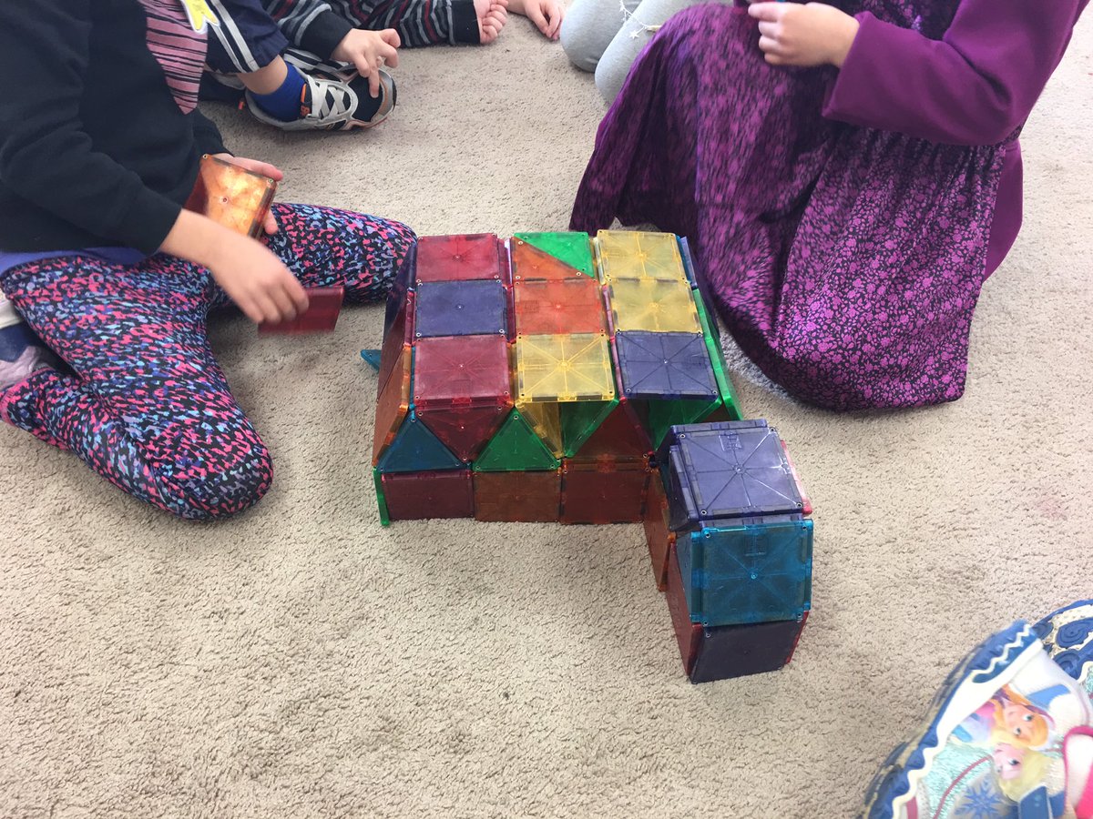 mrfewkes's tweet photo. We got the magnatiles back in our classroom today. We've noticed that 2D shapes can turn into 3D when stacked. "Fat not flat!" #mathwrdsb https://t.co/3dr880Uxu5